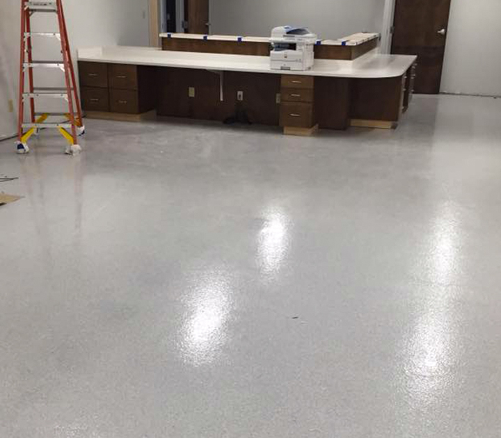 Decorative flake epoxy floor for a business office, installed by J&A Services in Fairhope, Alabama
