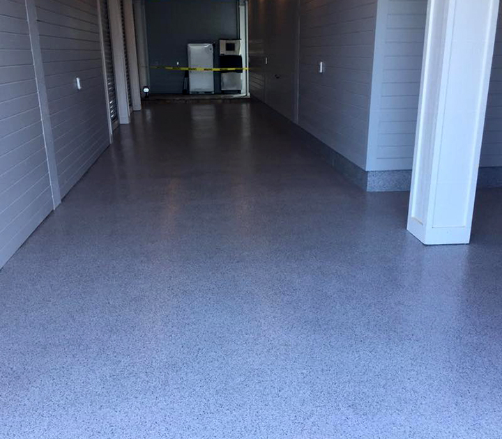 decorative flake epoxy floor, perfect for a high traffic space like this high school in Chickasaw, Alabama