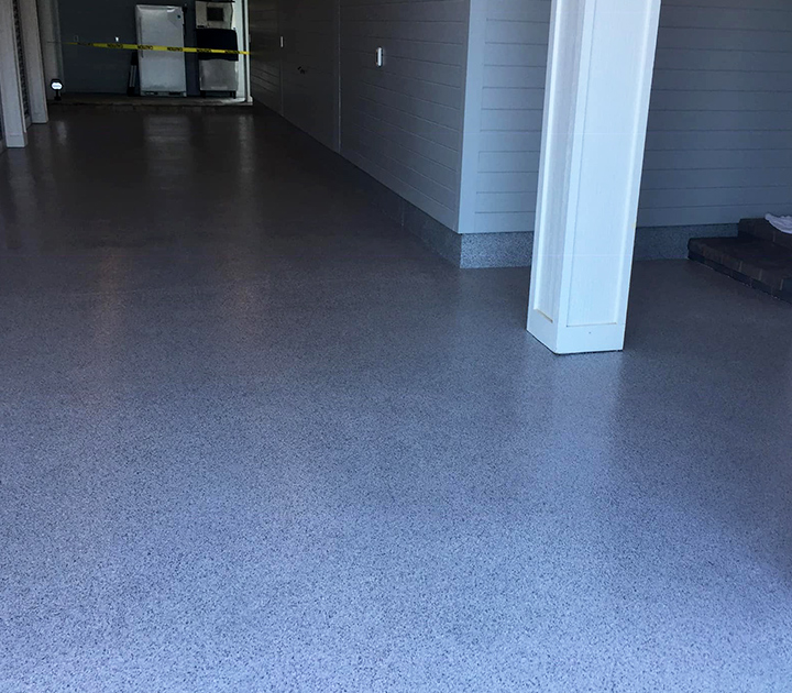 decorative flake epoxy floor, perfect for a high traffic space like this high school in Chickasaw, Alabama